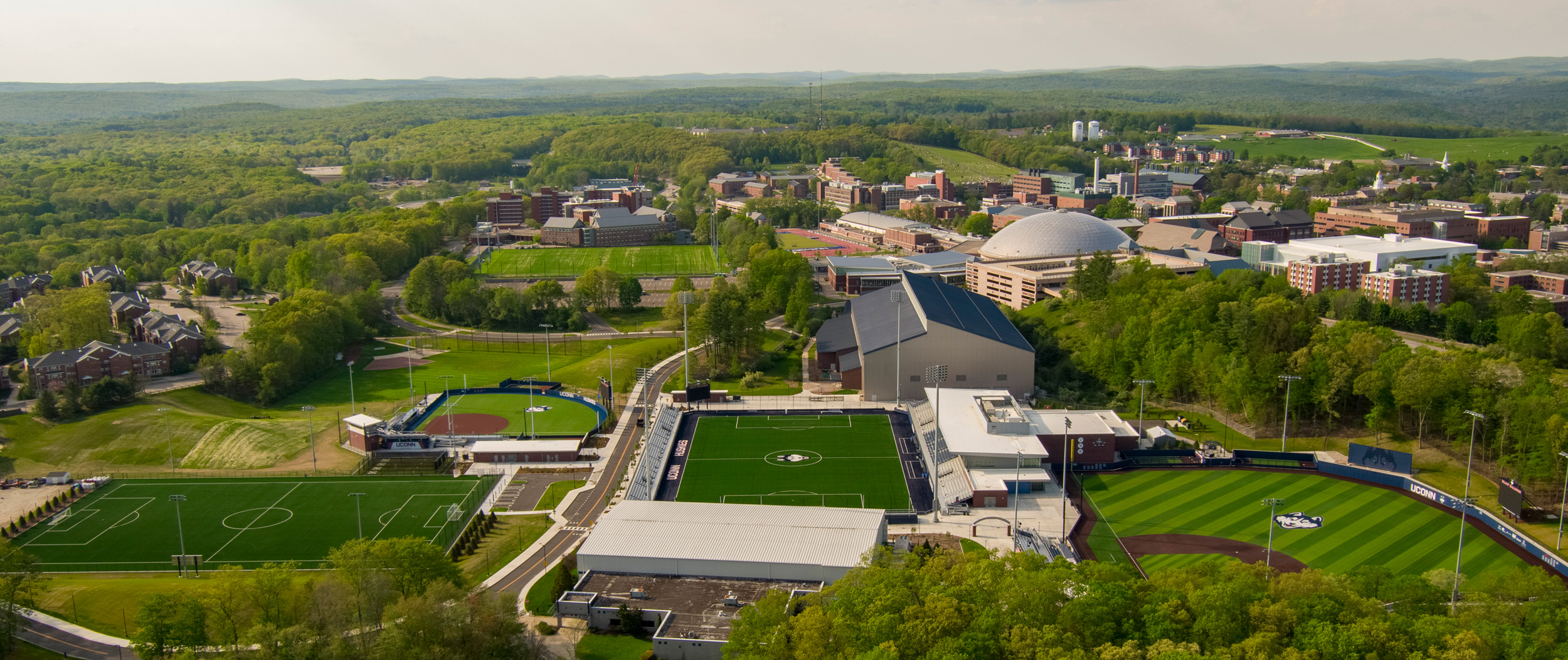 Fields210518a002-wide UConn Athletic District improvements aerial view