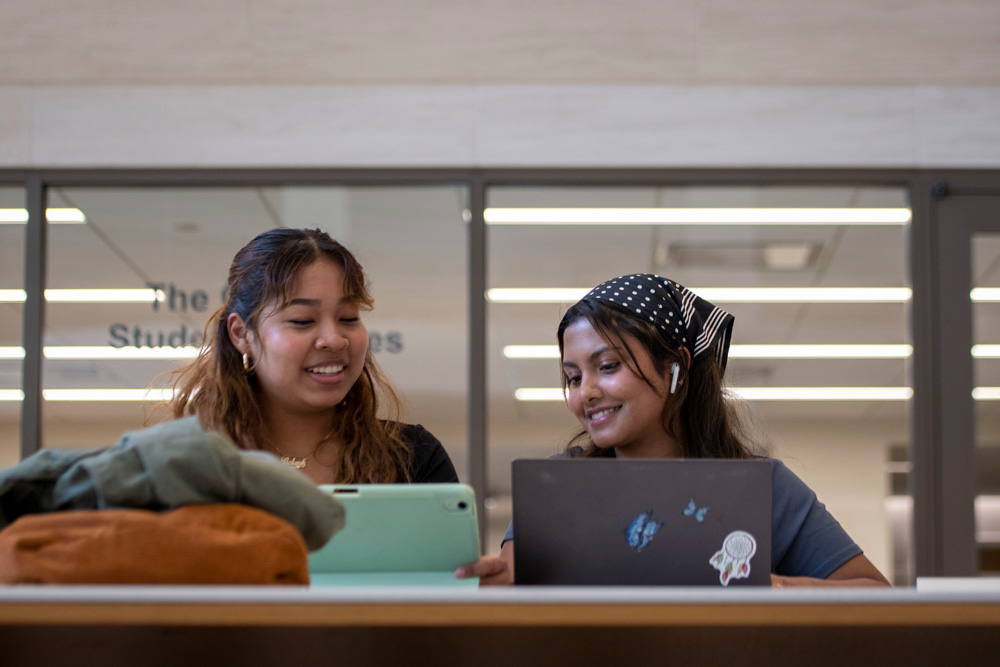 hartford220413d0123 UConn Hartford students studying in the atrium lobby.