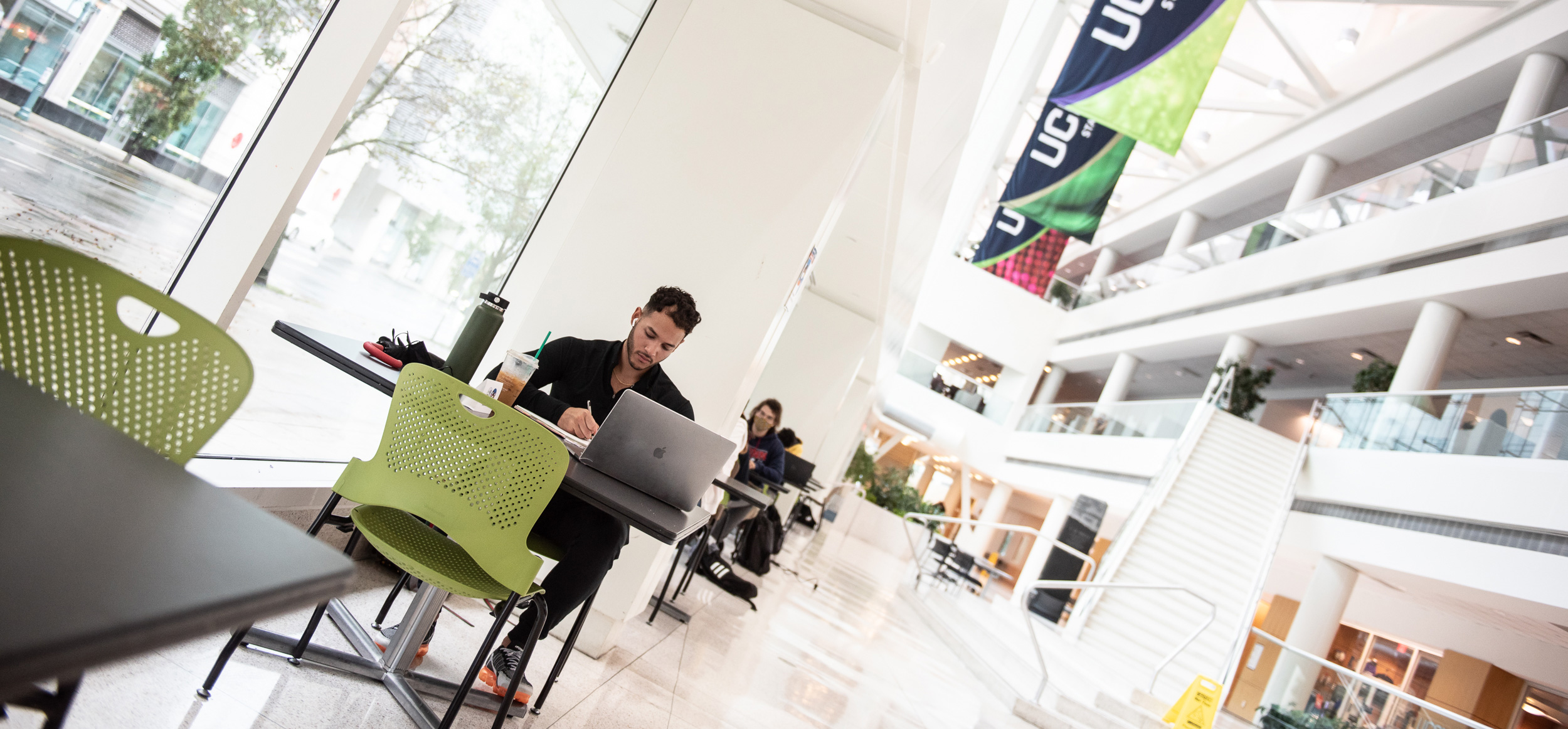 A student studying on the Stamford campus