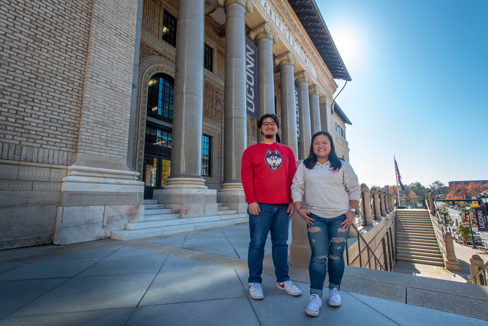 Andrew Lanza and Andrea Ybanez in front of the Hartford Tmes Building at UConn Hartford.