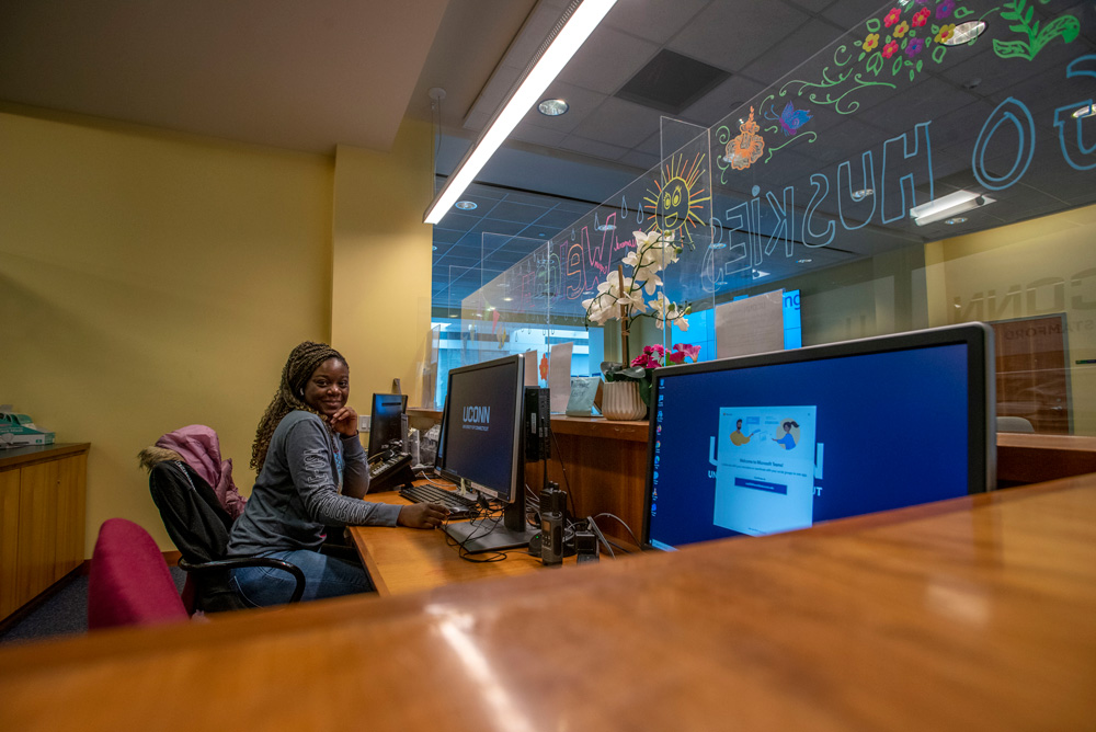 UConn Stamford student worker at the admissions office.