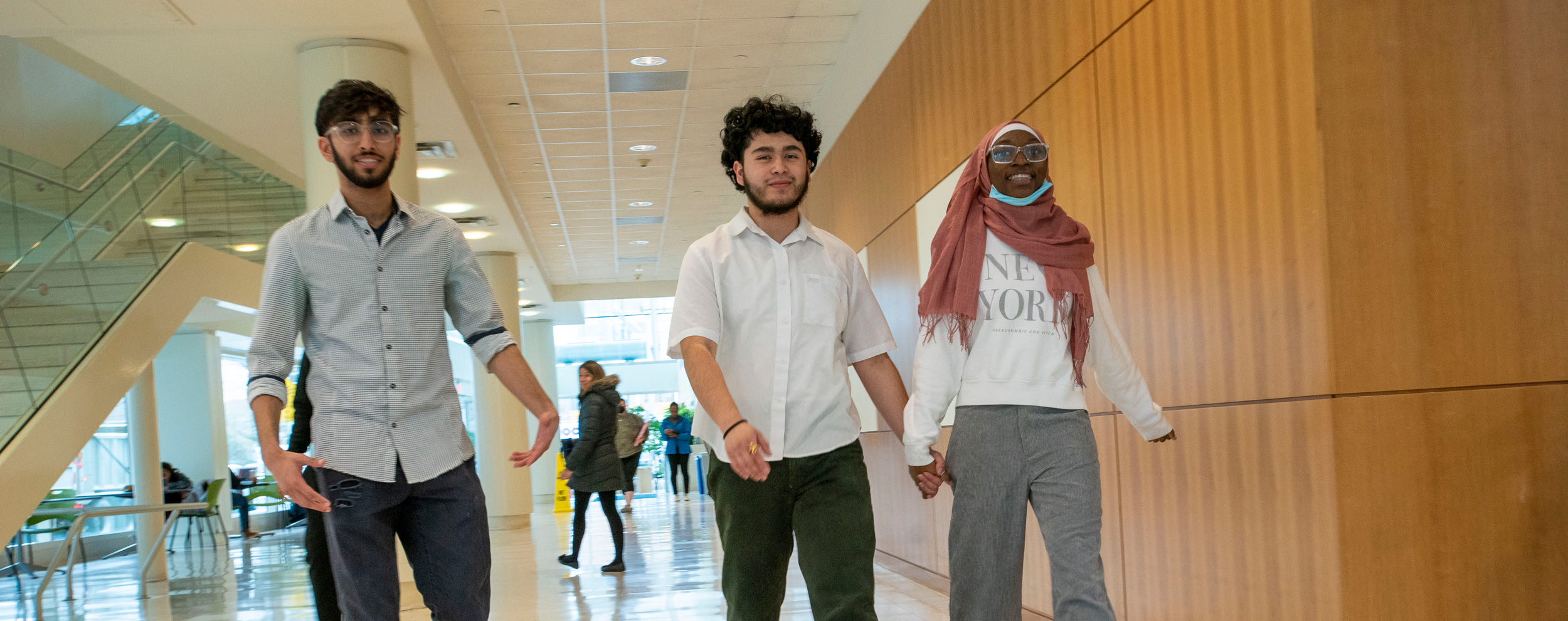 UConn Stamford students walking.