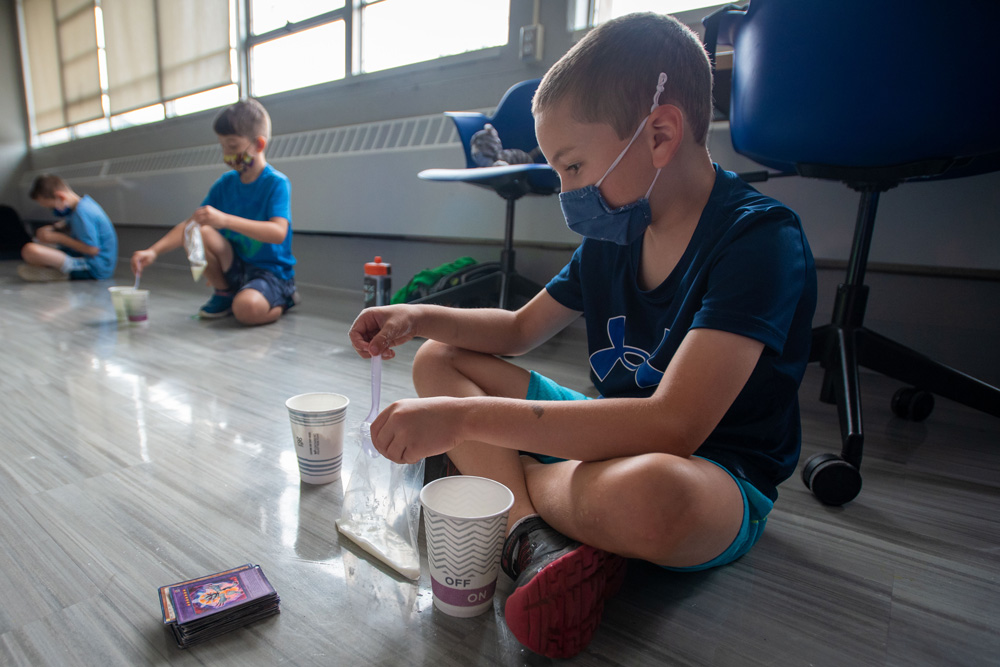 Children at B.R.A.I.N. Camp (Bridging Reading and Intervention with Neuroscience) learning how to create Oobleck