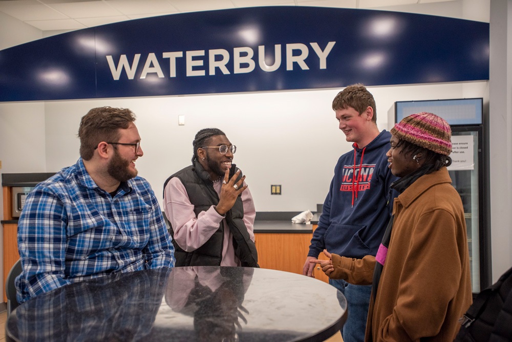 Group of students in the lounge at the Waterbury Campus.