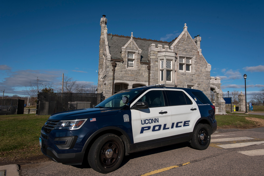 UConn police car and building at Avery Point