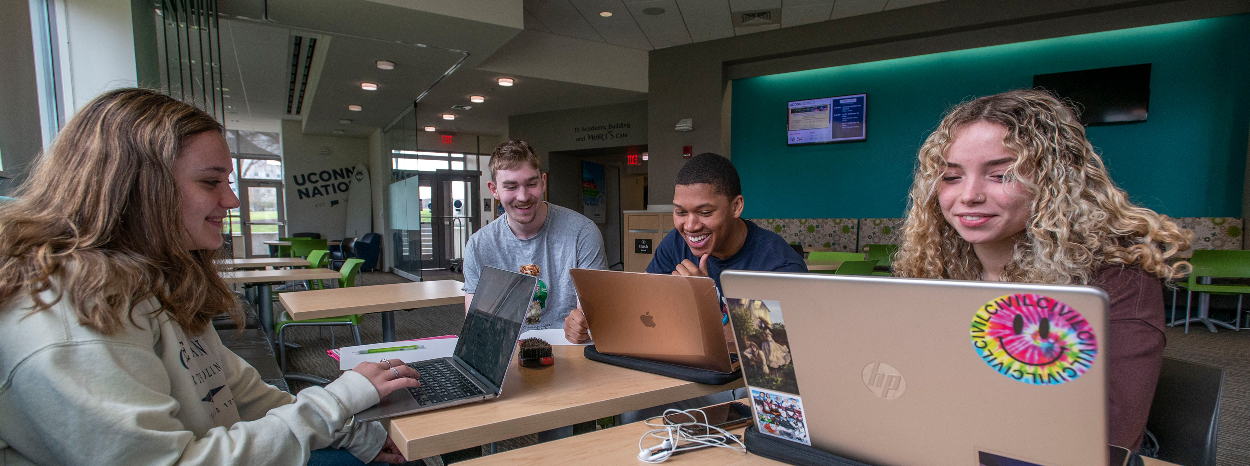 Students studying at the Avery Point Student Center